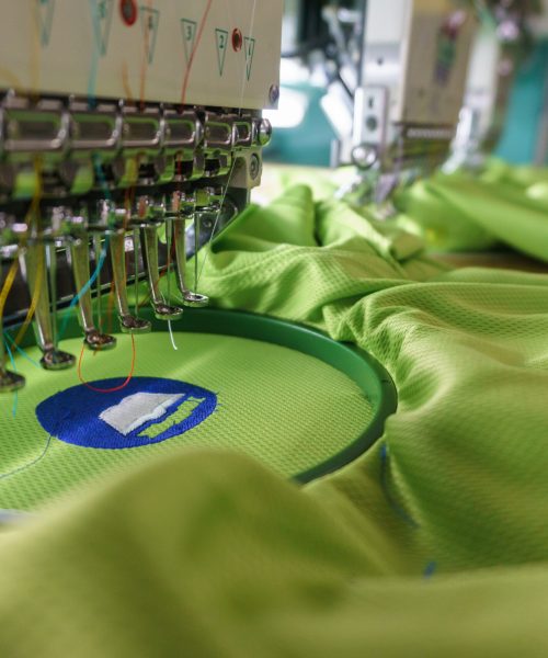 Embroidery machine needle in Textile Industry at Garment Manufacturers, Embroidery T-shirt in progress, Needle with thread (selective focus and soft focus) Embroidery machine needle in Textile Industry at Garment Manufacturers, Embroidery T-shirt in progress, Needle with thread (selective focus and soft focus)